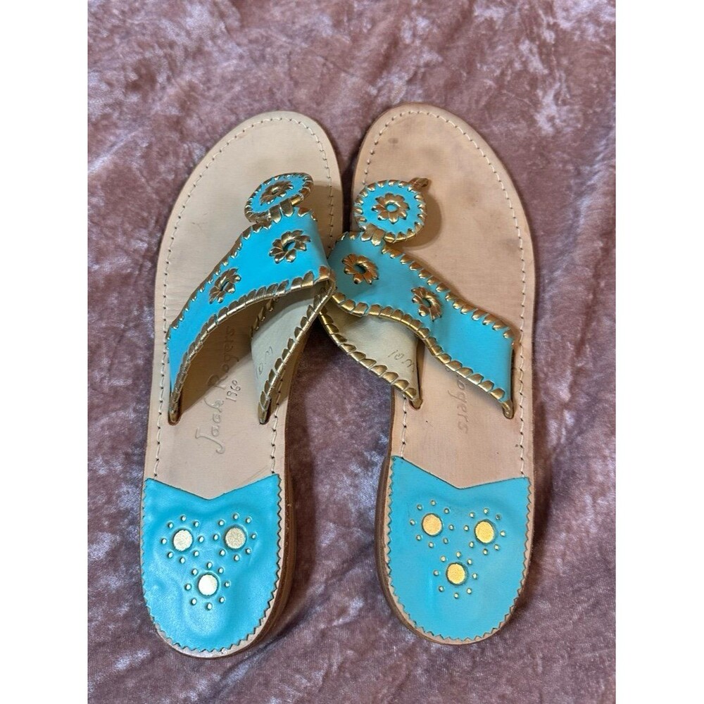 Jack Rodger’s teal sandals